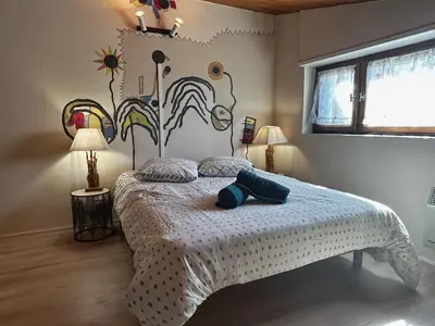 Un ou plusieurs lits dans un hébergement de l'établissement La maison de papa
