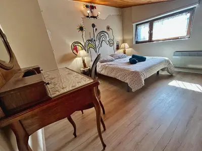 Un ou plusieurs lits dans un hébergement de l'établissement La maison de papa