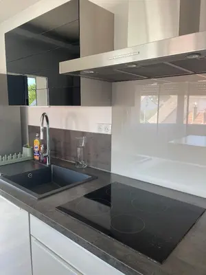 Cuisine ou kitchenette dans l'établissement Appartement spacieux et son rooftop