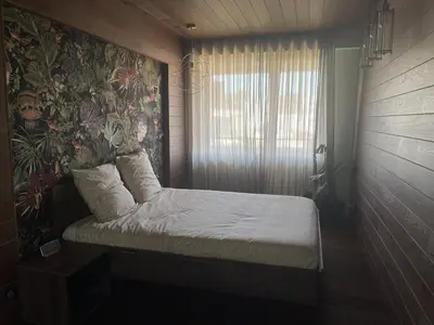 Un ou plusieurs lits dans un hébergement de l'établissement Appartement spacieux et son rooftop