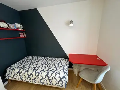 Un ou plusieurs lits dans un hébergement de l'établissement Superbe appartement atypique au cœur de Mulhouse