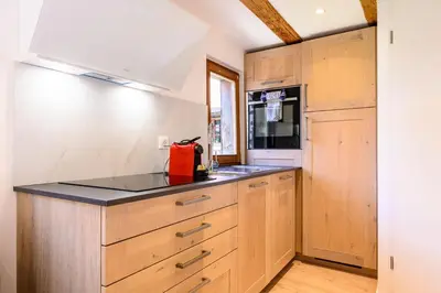 Cuisine ou kitchenette dans l'établissement Maisonnette Alsacienne en plein coeur de Turckheim