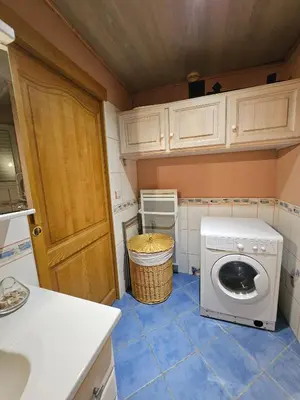 Cuisine ou kitchenette dans l'établissement Chez Corinne