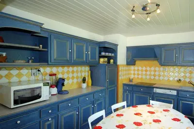 Cuisine ou kitchenette dans l'établissement Chez Corinne