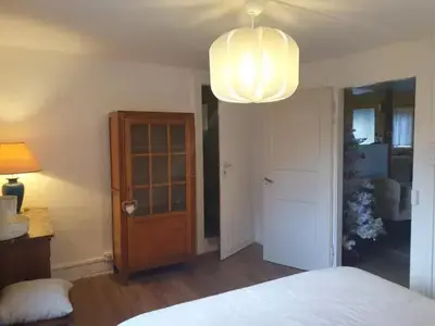 Un ou plusieurs lits dans un hébergement de l'établissement Maison spacieuse à Sainte-Croix-en-Plaine avec jardin