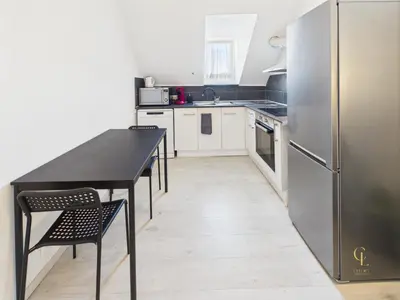 Cuisine ou kitchenette dans l'établissement Cocon Jaune - Duplex 2e étage prox centre Mulhouse