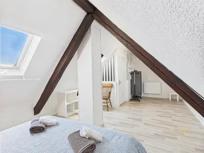 Un ou plusieurs lits dans un hébergement de l'établissement Cocon Jaune - Duplex 2e étage prox centre Mulhouse