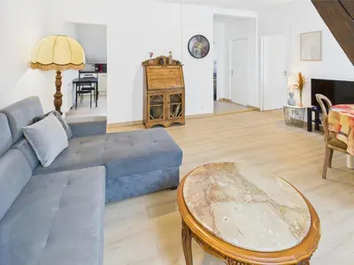 Coin salon dans l'établissement Cocon Jaune - Duplex 2e étage prox centre Mulhouse