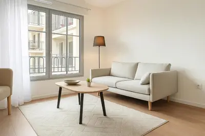 Coin salon dans l'établissement Zenao Appart'hôtels Wintzenheim