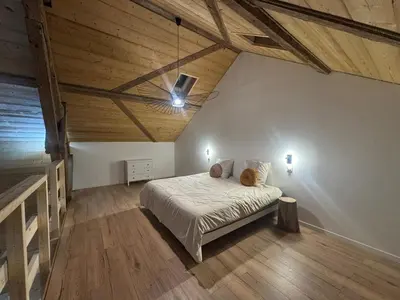 Un ou plusieurs lits dans un hébergement de l'établissement Gîte du Château - Jaccuzzi