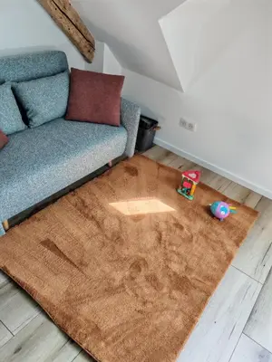 Coin salon dans l'établissement Spacieux, cosy et tout équipé pour un confort optimal