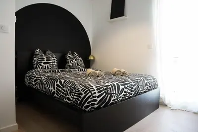 Un ou plusieurs lits dans un hébergement de l'établissement Superbe maison au calme avec stationnement gratuit