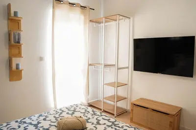 Un ou plusieurs lits dans un hébergement de l'établissement Superbe maison au calme avec stationnement gratuit