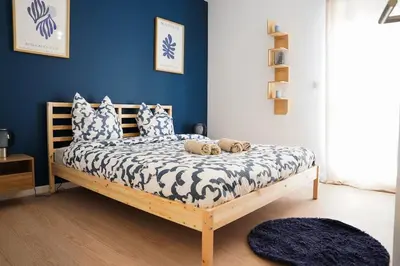 Un ou plusieurs lits dans un hébergement de l'établissement Superbe maison au calme avec stationnement gratuit