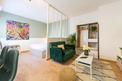 Coin salon dans l'établissement Lambert City Appartement Centre Mulhouse