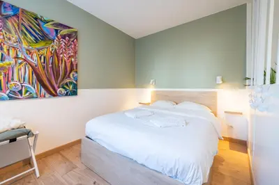 Un ou plusieurs lits dans un hébergement de l'établissement Lambert City Appartement Centre Mulhouse