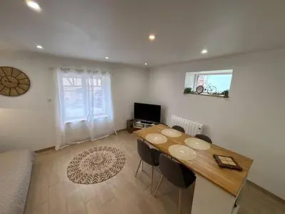 Télévision ou salle de divertissement dans l'établissement L'ecrin d'Alsace