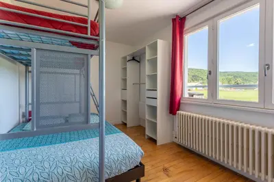 Un ou plusieurs lits dans un hébergement de l'établissement Gîte de la Grange 12km de Gérardmer