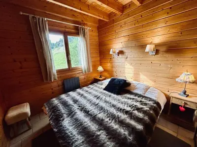 Un ou plusieurs lits dans un hébergement de l'établissement Chalet Le Meix-SaGe