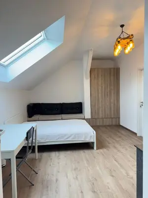 Un ou plusieurs lits dans un hébergement de l'établissement New appartement