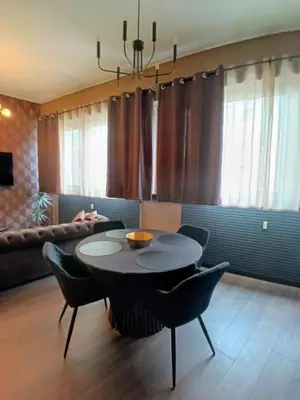Coin salon dans l'établissement Appart'Hôtel 