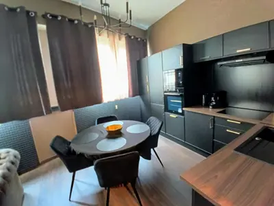 Cuisine ou kitchenette dans l'établissement Appart'Hôtel 