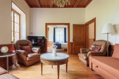 Coin salon dans l'établissement Gîte de l'Oriel - Gîte avec Grand Jardin