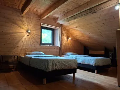 Un ou plusieurs lits dans un hébergement de l'établissement La Ferme Alter Native