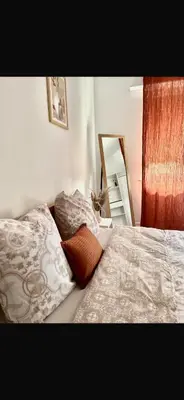 Un ou plusieurs lits dans un hébergement de l'établissement A deux pas du musee de l automobile
