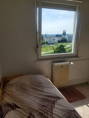 Un ou plusieurs lits dans un hébergement de l'établissement Green room
