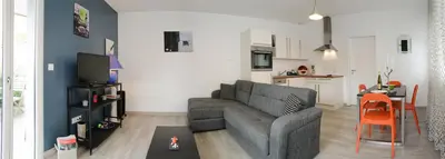 Télévision ou salle de divertissement dans l'établissement Gite 1 - les Arômes