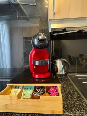 Cuisine ou kitchenette dans l'établissement Maison de vacances