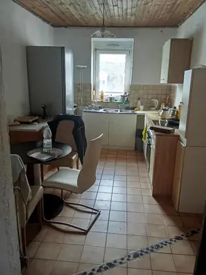 Cuisine ou kitchenette dans l'établissement Zimmer chambre dans une Appartemnt a mulhouse