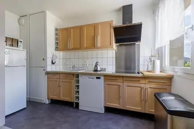 Cuisine ou kitchenette dans l'établissement Le Rep'air vosgien - Proche Stations de Ski