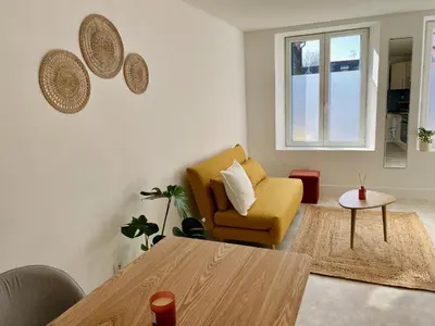 Coin salon dans l'établissement Charmant appartement en rez-de-chaussée