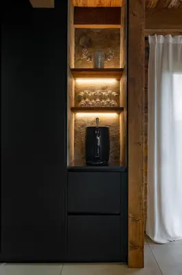 Cuisine ou kitchenette dans l'établissement Chalet Le Cocon des Marmottes