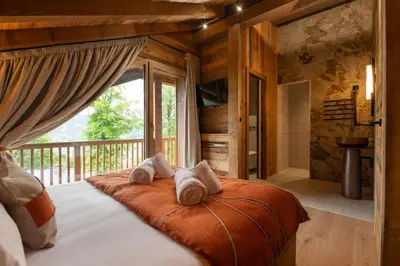 Un ou plusieurs lits dans un hébergement de l'établissement Chalet Le Cocon des Marmottes