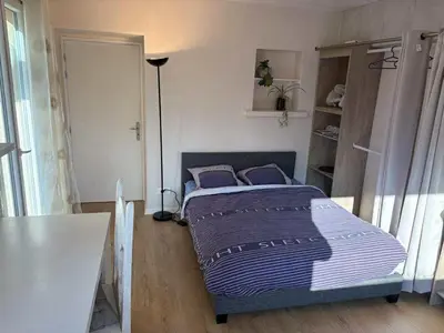 Un ou plusieurs lits dans un hébergement de l'établissement Clos de la filature sauna et bien-être