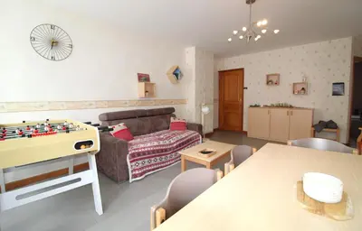 Coin salon dans l'établissement Appartement tout confort à Gérardmer avec sauna, proche du lac et des commerces