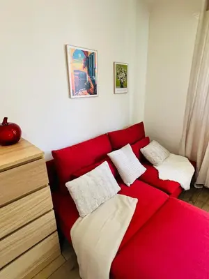 Un ou plusieurs lits dans un hébergement de l'établissement Modern Loft Basel Airport ArtBasel