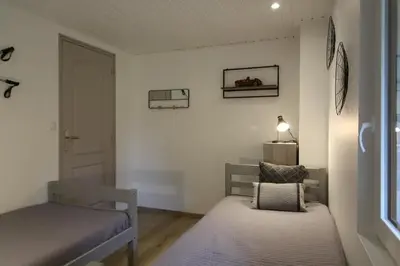 Coin salon dans l'établissement Chalet 6 personnes au Ménil - Vosges - Vacances nature en famille