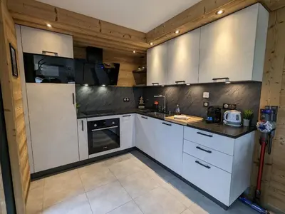 Cuisine ou kitchenette dans l'établissement Appartement familial proche lac et centre à Gérardmer - 4 pers, animaux admis - FR-1-589-818