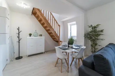 Coin salon dans l'établissement Le Sweet Duplex