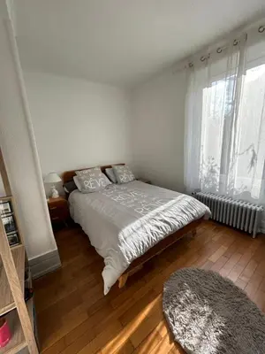 Un ou plusieurs lits dans un hébergement de l'établissement Séjour entre ville et montagnes Appartement 90 m2