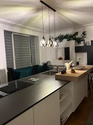 Cuisine ou kitchenette dans l'établissement Séjour entre ville et montagnes Appartement 90 m2