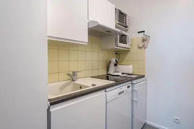Cuisine ou kitchenette dans l'établissement Le Chitelet 506 - Au pied des pistes