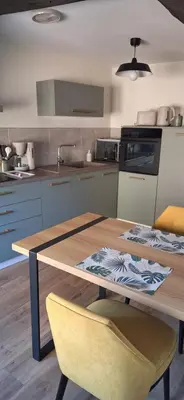 Cuisine ou kitchenette dans l'établissement Gîte ramloc
