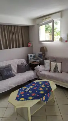 Coin salon dans l'établissement Maison le Trèfle Argenté