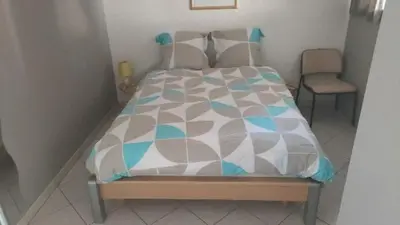 Un ou plusieurs lits dans un hébergement de l'établissement Maison le Trèfle Argenté