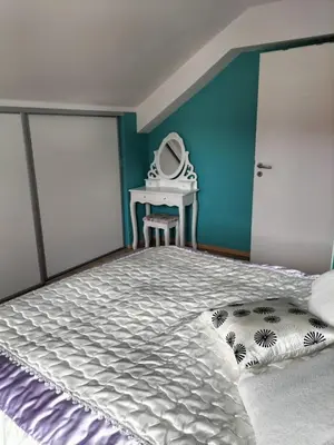 Un ou plusieurs lits dans un hébergement de l'établissement Maison le Trèfle Argenté